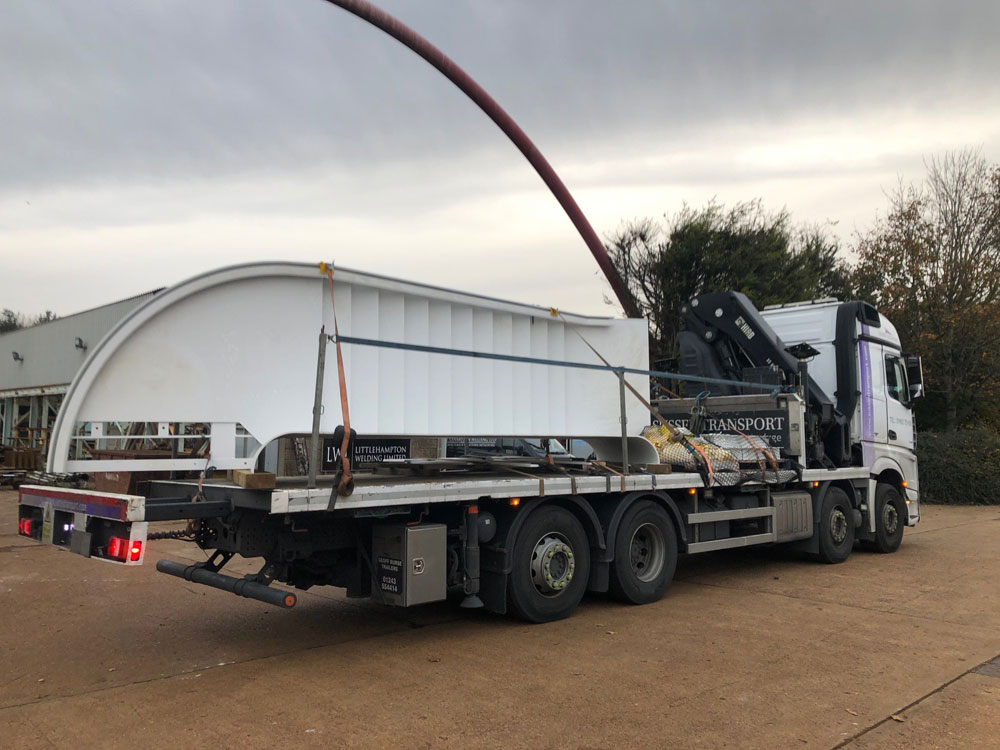 A Sussex Transport lorry with a trailer neatly stacked with cargo to help illustrate the need for load security.