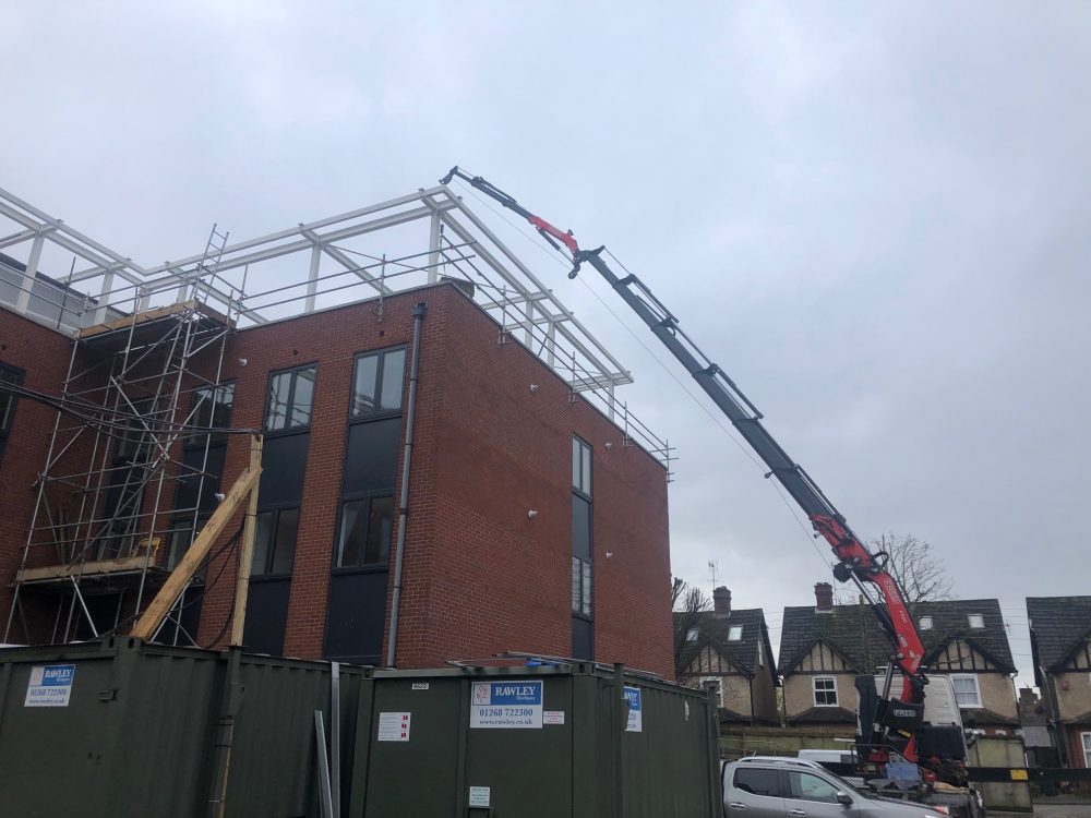 Lifting Timber into new Floor HIab