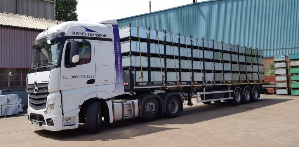 truck with goods strapped down